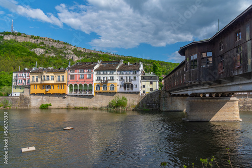 Covered wooden bridge in the town of Lovech in Bulgaria over the Osam river photo