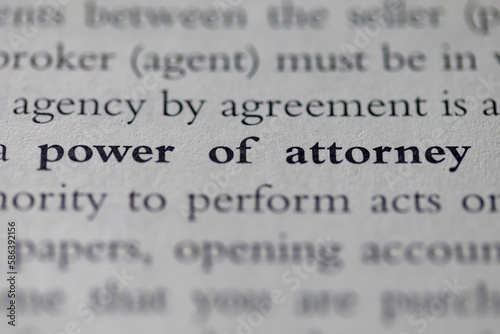 power of attorney POA printed in text on page as visual aid or business law reference