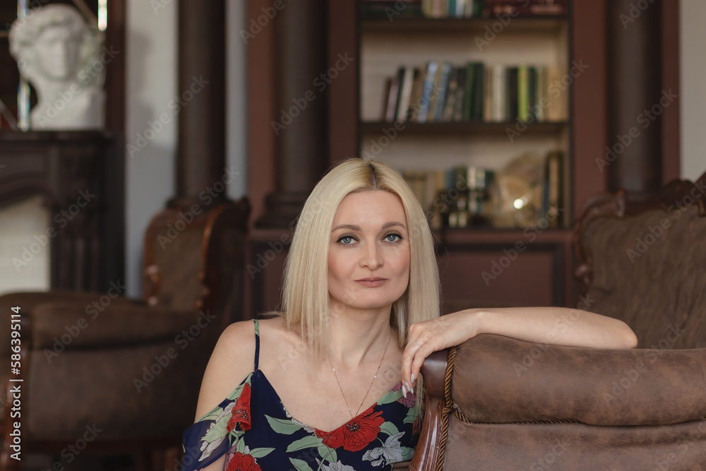 Fototapeta premium portrait of a young woman in the home interior