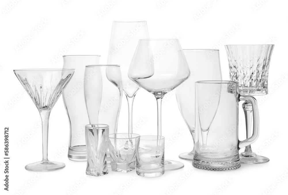 Different elegant empty glasses isolated on white
