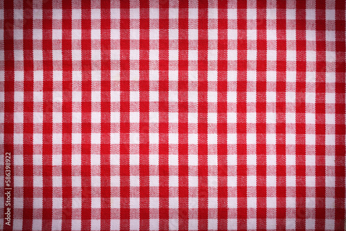 Red and white tablecloth as background, vignette effect