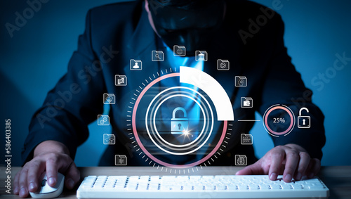 Hacker hacks network, cybersecurity vulnerability Log4J and hacker,coding,malware concept.Hooded computer hacker in cybersecurity vulnerability Log4J, metaverse digital world technology.