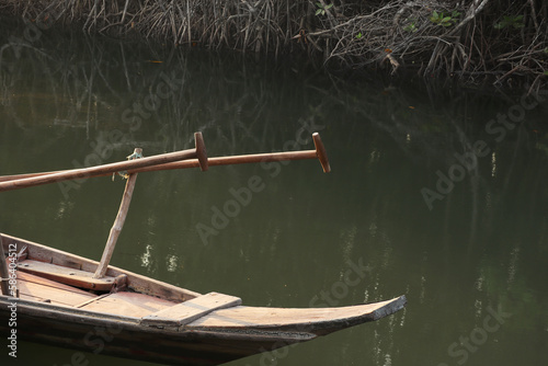 Close-up of Traditional Thai boat called gondola or Ruea Mard at Salak Khok fisherman village,  Koh Chang Trat, Thailand.  photo