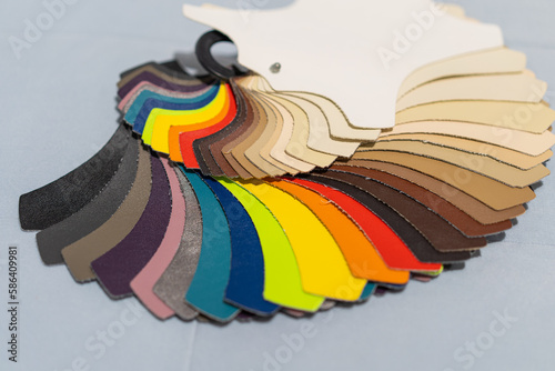 Catalog of multicolored imitation leather from matting fabric texture background  leatherette fabric texture. Industry background.