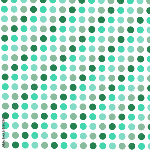 green and white polka dot pattern with a white background. photo