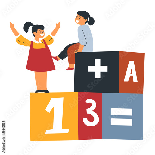 Girls playing cubes with maths numbers and letters