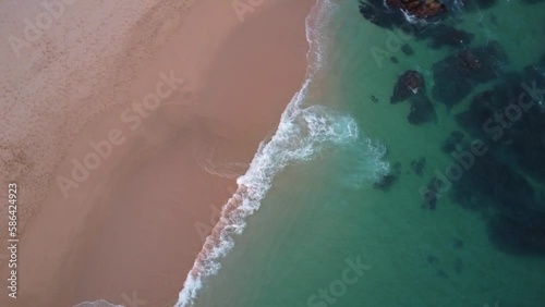 drone footage panoramic view of huatulco oaxaca mexico summer travel destination tropical beach sea waves and a minimalist turquoise water