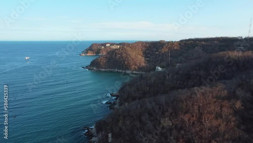 drone footage panoramic view of huatulco oaxaca mexico summer travel destination tropical beach sea riscalillo and the sea in the background