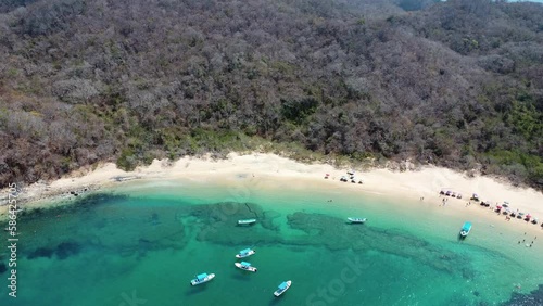 drone footage panoramic view of huatulco oaxaca mexico summer travel destination tropical la india beach sea