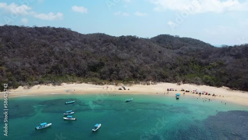 drone footage panoramic view of huatulco oaxaca mexico summer travel destination tropical beach sea in la india spot