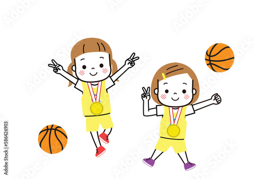 金メダルをもらって大喜びしているバスケットボールチームの女の子たち