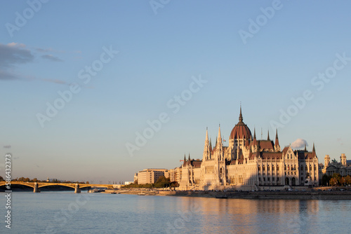 Budapest parliament in magic sunset, and the Danube river, Hungary