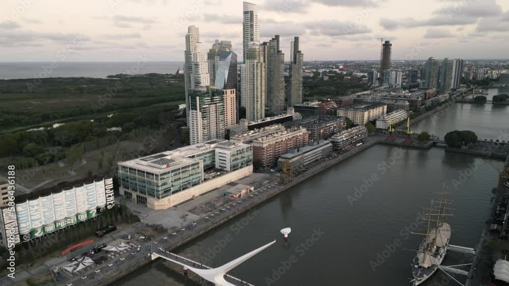 Woman's Bridge and Skyscrapers of Puerto Madero Buenos Aires Aerial Drone View Above Argentinian Urban Central and Ecological Reserve Woman's Bridge and Skyscrapers of Puerto Madero Buenos Aires Aerial Drone View Above Argentinian Urban Central and Ecological Reserve