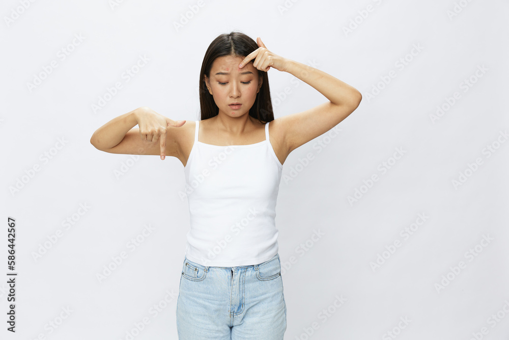 Asian woman facial skin problems, acne and inflammation, red rashes and allergies, chicken pox, sadness from rashes. Facial skin care concept for diseases and nerves Asian woman facial skin problems, acne and inflammation, red rashes and allergies, chicken pox, sadness from rashes. Facial skin care concept for diseases and nerves