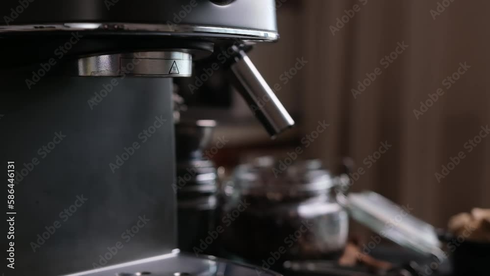 closeup Slow motion purging steam wand of coffee machine closeup Slow motion purging steam wand of coffee machine