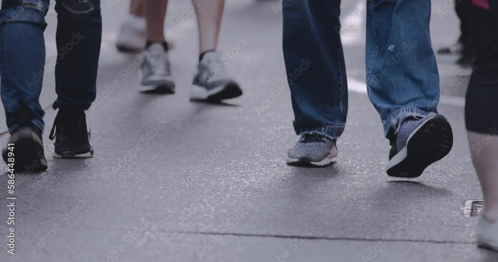 Pedestrians' Feet On A Busy Street, Close-Up Pedestrians' Feet On A Busy Street, Close-Up