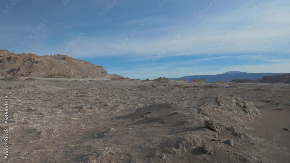 Travelling in a lunar and desertic landscape in the Death Valley, Atacama, Chile Travelling in a lunar and desertic landscape in the Death Valley, Atacama, Chile