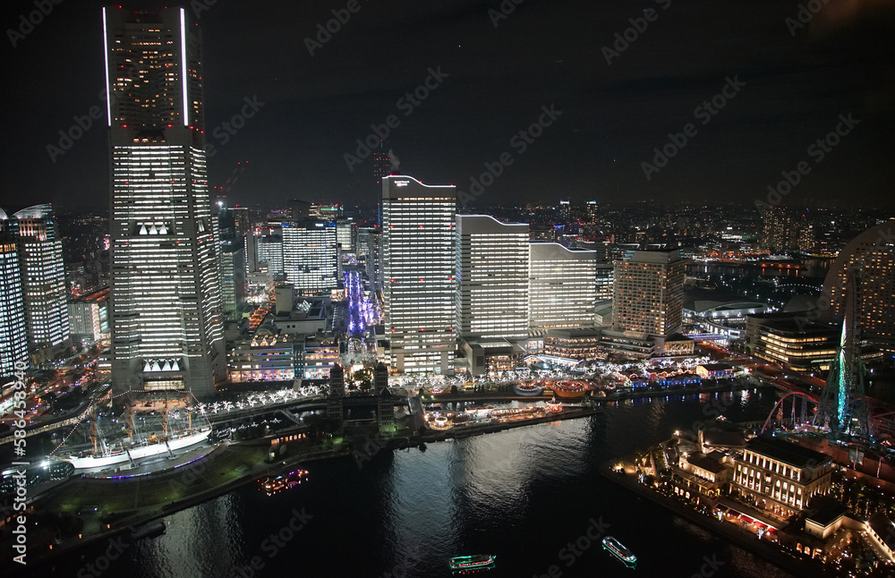 Night view of modern skyscrapers illuminated in Japan Yokohama Port City