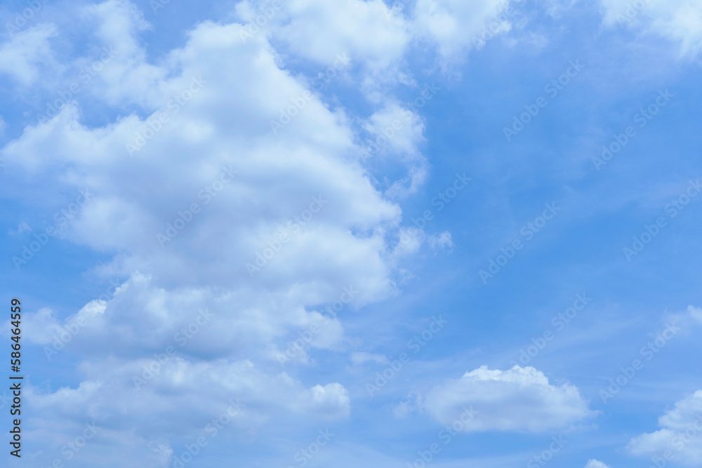 Soft cloud in hard sunlight on blue sky background