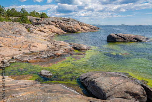 View of the rocky shore of Puistovuori and Gulf of Finland, Hanko, Finland photo