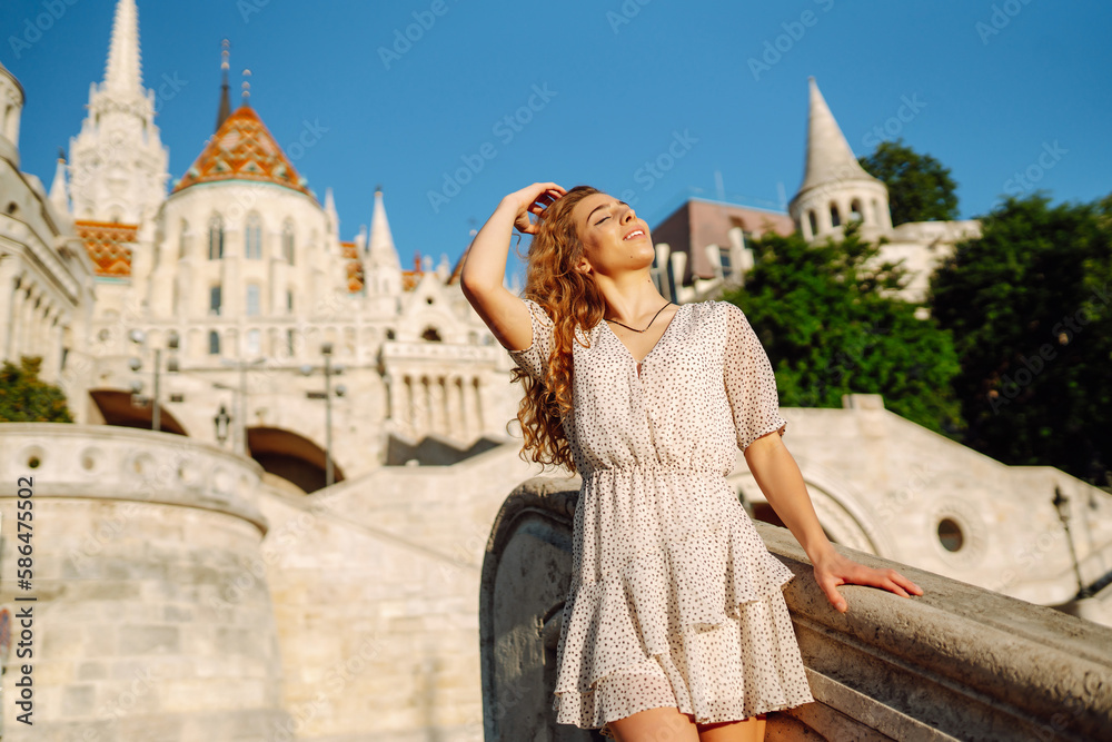Young pretty woman outdoor fashion portrait. Travel and tourism concept.