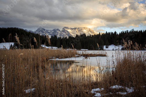 Winter hike to Geroldsee lake y sunset, Bayern, Germany © liliportfolio