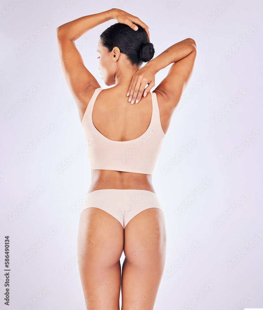Back skincare, woman body and butt in a studio with wellness, underwear and fitness. Cosmetics, liposuction and cellulite beauty treatment of a female with skin glow with isolated white background Back skincare, woman body and butt in a studio with wellness, underwear and fitness. Cosmetics, liposuction and cellulite beauty treatment of a female with skin glow with isolated white background