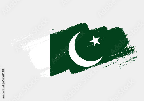 Artistic grunge brush flag of Pakistan isolated on white background. Elegant texture of national country flag