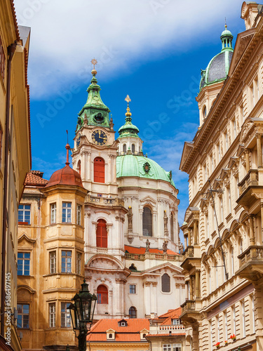 View of Prague historical center with Church of Saint Nicholas beautiful baroque dome and clock tower