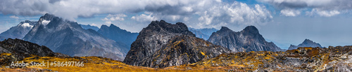 Wide panoramic view of the Rwenzori Mountains, Uganda. Weismanns peak summit in cloudy day. photo