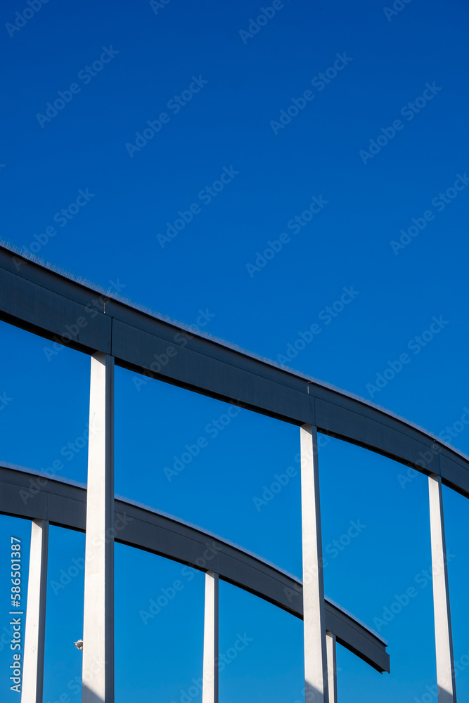 steel structure with blue sky in the background steel structure with blue sky in the background
