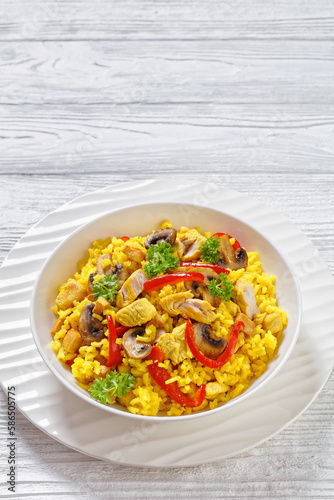 Chicken Paella with mushrooms, red pepper, spices
