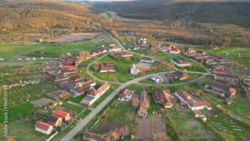 Charlottenburg, Romania - Round village Banat region western Transylvania, Romania. Aerial footage.