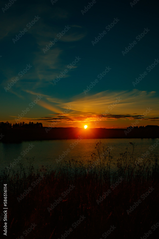 Beautiful sunset on river Kymijoki at autumn, Finland.