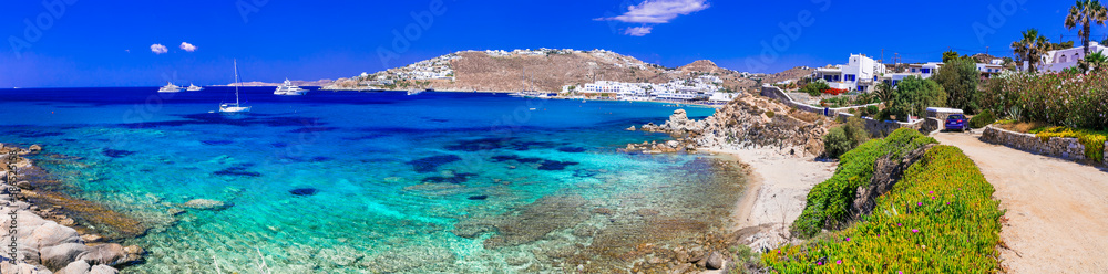 Mykonos island. Popular beautiful beach Platis Gialos. Greece summer holidays, Cyclades Mykonos island. Popular beautiful beach Platis Gialos. Greece summer holidays, Cyclades
