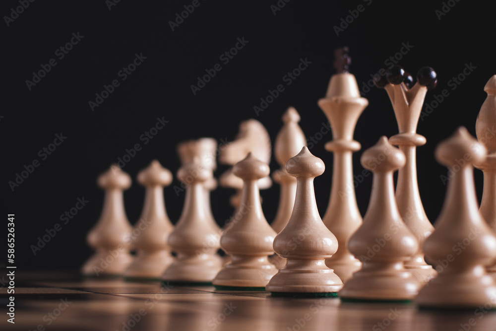 Chess figures on a black background Chess figures on a black background