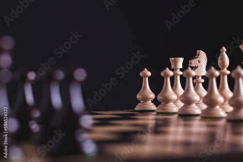 Chess figures on a black background