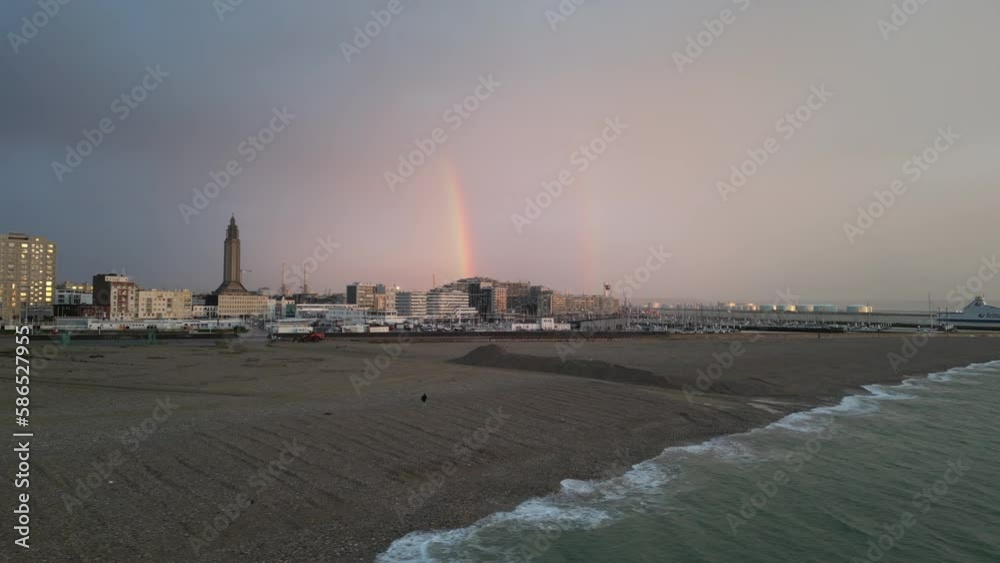 Rainbow over the beach and the port of Le Havre drone view