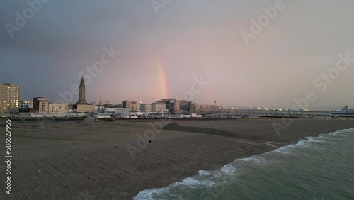 Rainbow over the beach and the port of Le Havre drone view