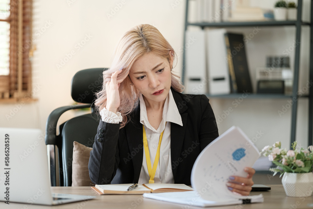 Close up on laptop in office, Asian happy beautiful businesswoman in formal suit work in workplace. Attractive female employee office worker smile. Close up on laptop in office, Asian happy beautiful businesswoman in formal suit work in workplace. Attractive female employee office worker smile.
