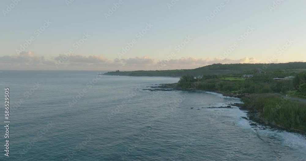 Aerial Beautiful View Of Green Trees On Hills, Drone Flying Forward Over Sea Against Cloudy Sky At Sunset - Kapalua, Hawaii Aerial Beautiful View Of Green Trees On Hills, Drone Flying Forward Over Sea Against Cloudy Sky At Sunset - Kapalua, Hawaii