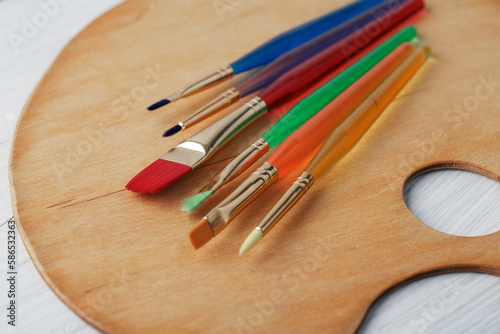 brushes and wooden palette 