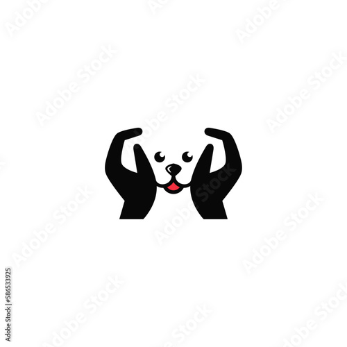 The hand caresses the dog. Negative space logo design.