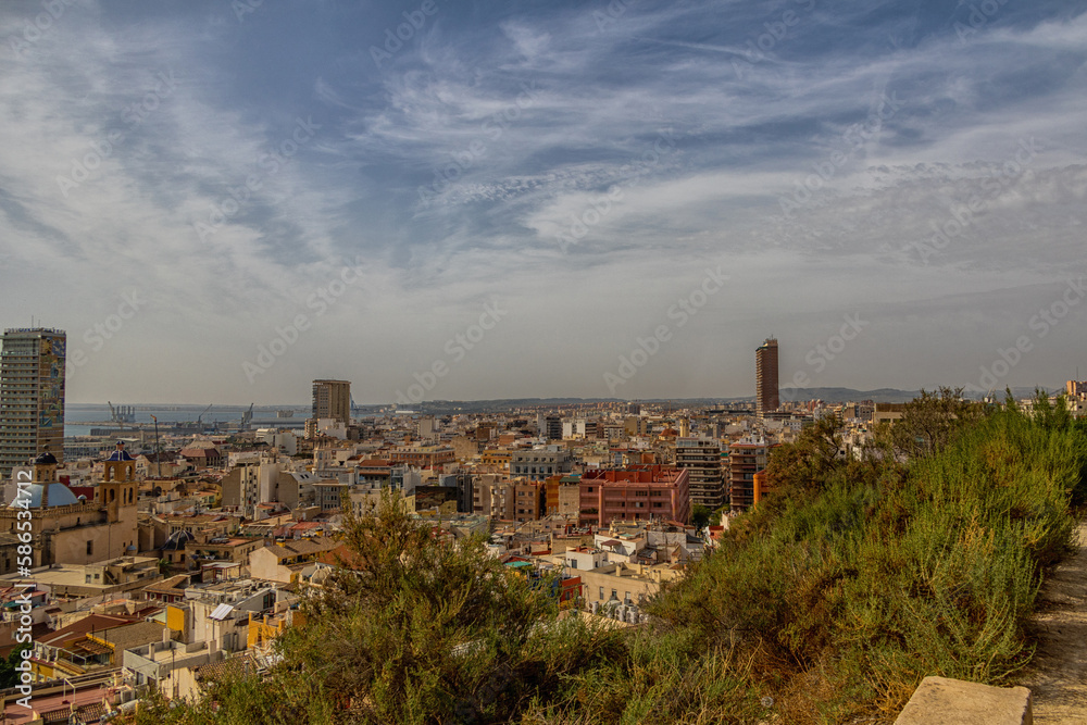 landscape of the city of Alicante panorama from the viewpoint of the city and the port on a warm sunny day