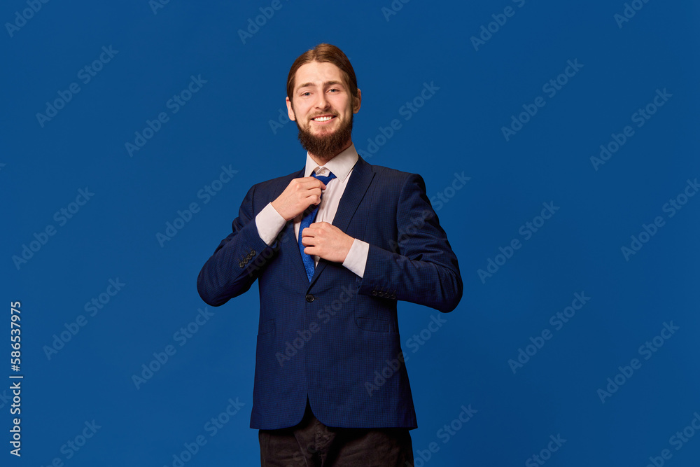 Motivated, ambitious employee. Portrait of young smiling man in formal