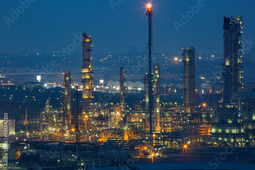 Morning scene of oil refinery plant and power plant of Petrochemistry  in the morning time on the top of the hill © chitsanupong