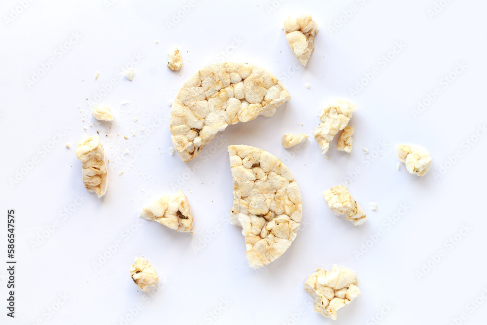 Broken puffed rice cracker isolated on white background Broken puffed rice cracker isolated on white background