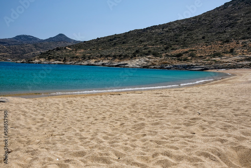 Fototapeta Naklejka Na Ścianę i Meble -  Panoramic view of the wonderful turquoise sandy beach of Plakes in Ios Greece