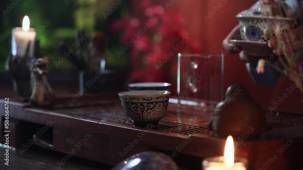 tea party, a female tea master pours hot steaming water into a bowl with Chinese tea leaves during a traditional Chinese ceremony, close-up tea party, a female tea master pours hot steaming water into a bowl with Chinese tea leaves during a traditional Chinese ceremony, close-up