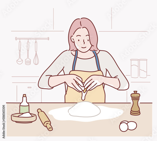 Woman cracking an egg to a flour.  Hand drawn style vector design illustrations.